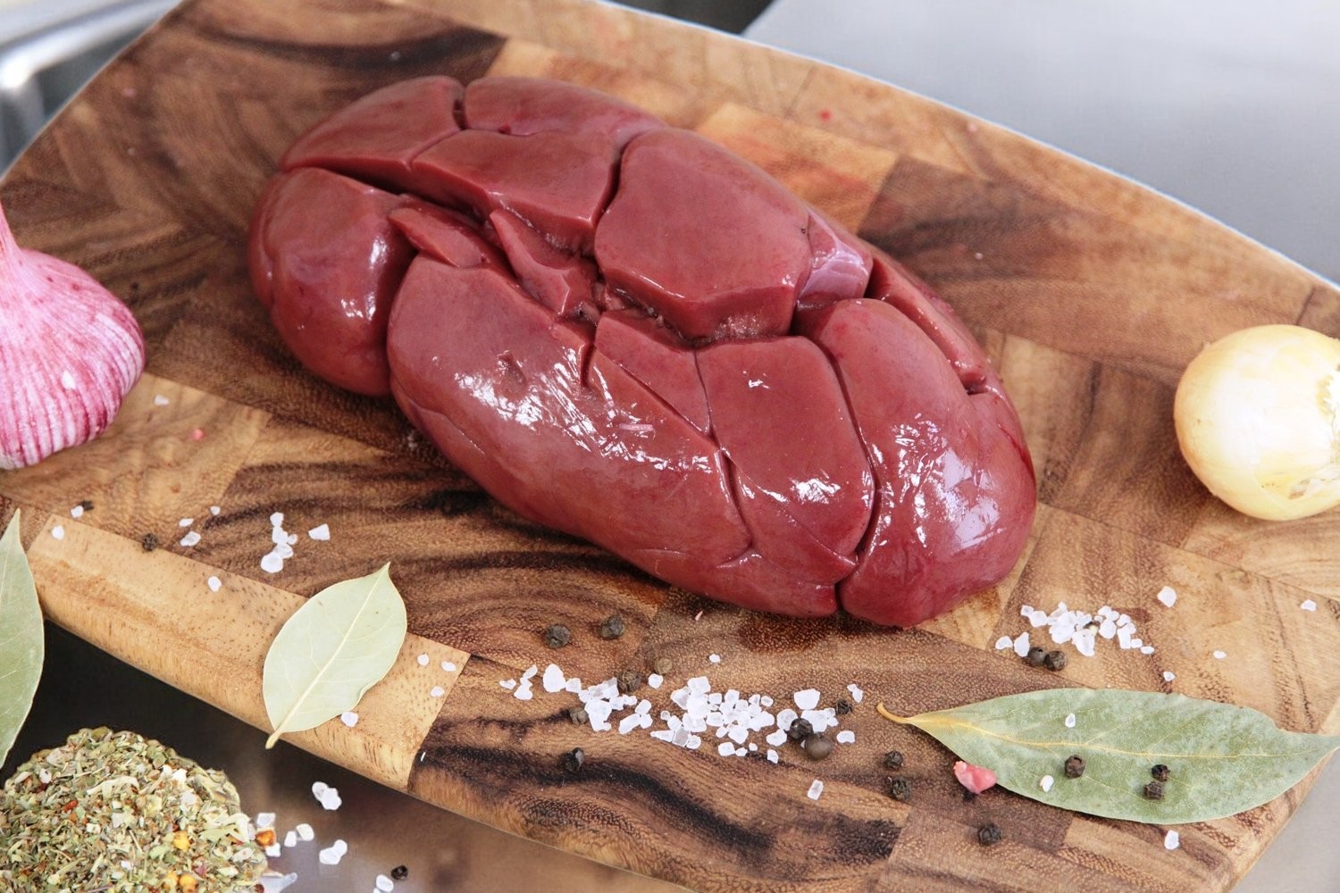 Субпродукты мясные обработанные мякотные почки говяжьи зам.вак.упак. 1кг