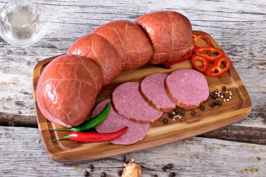 Колбасное изделие в/к колбаса мясная “Сервелат Купеческий” в/с мгс (нат.оболочка)