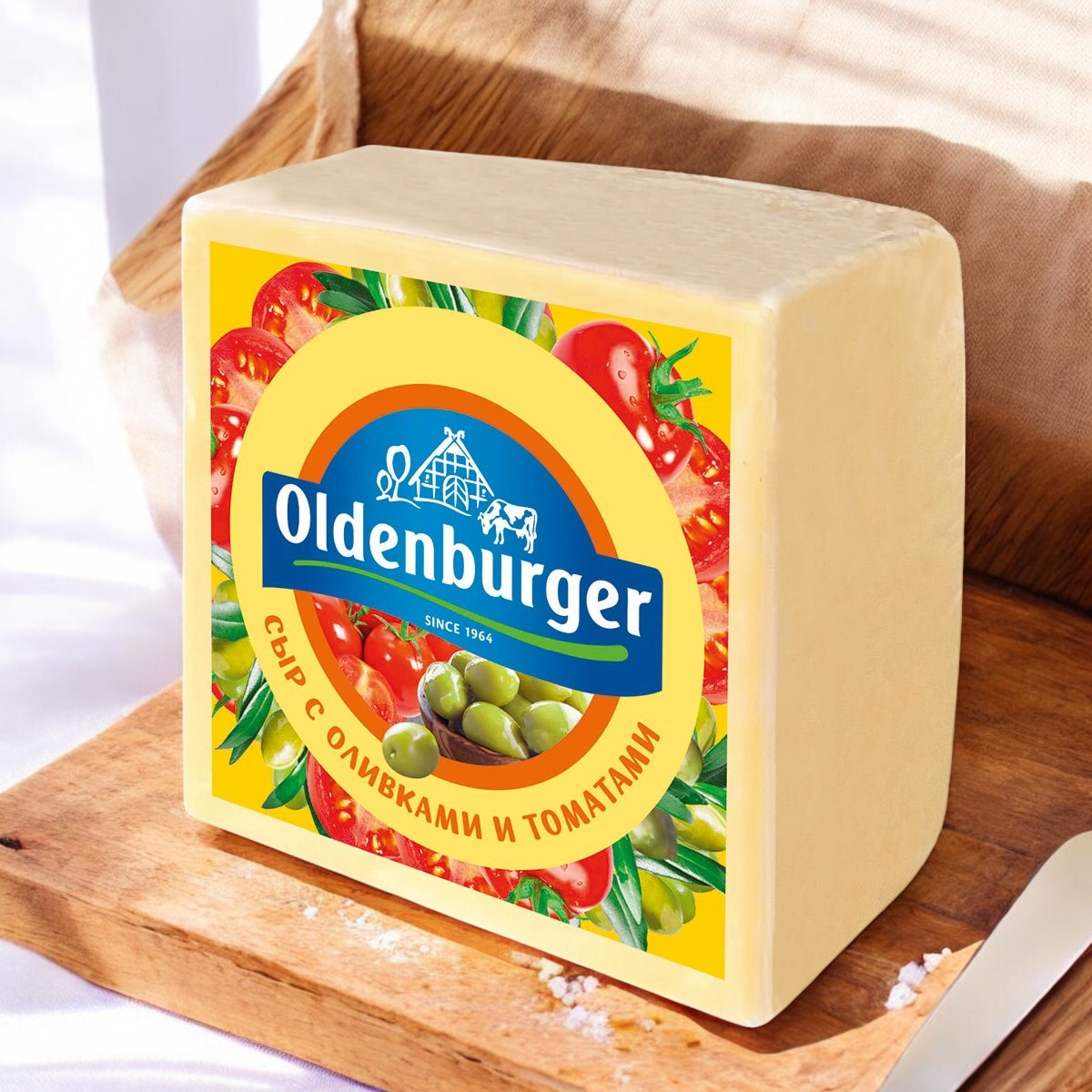 Сыр с оливками и томатами 45% ТМ “Oldenburger” кусковой ~1,1 кг