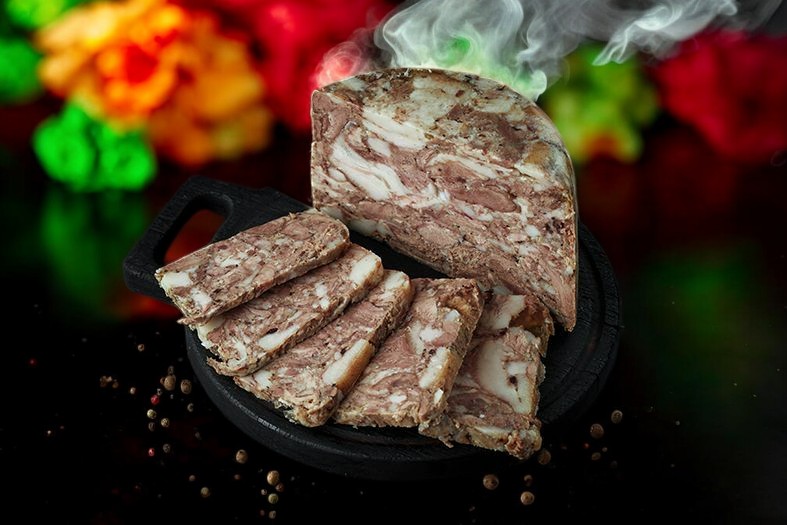 Мясо свиных голов прессованное (Псельский МК)